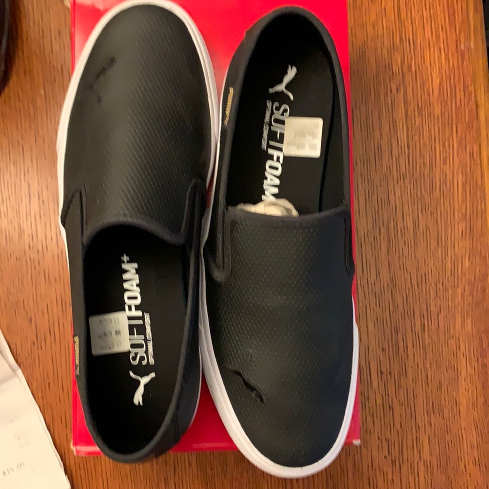 Brand new Puma slip on soft foam shoes.